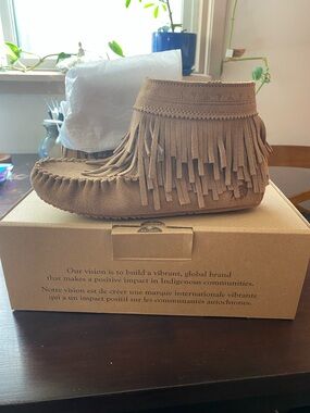 Minnetonka Suede Fringe Ankle Bootie in Tan
